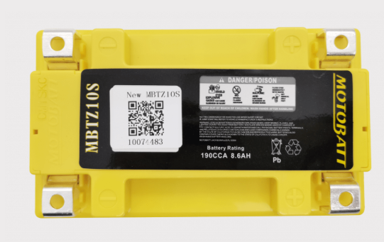 Motobatt MBTZ10S battery with yellow case; motorcycle battery showing terminals and label.