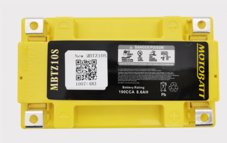 Motobatt MBTZ10S battery with yellow case; motorcycle battery showing terminals and label.