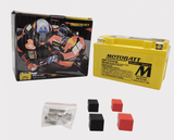 Motobatt MBTZ10S motorcycle battery with yellow case, boxed with hardware bag and two black and two red blocks.