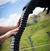 LifeGuard CPD & Mounting – Trax black mounting track held by hands outdoors