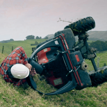 QuadGuard CPD & Mounting – Trax, black, by DGT Agri, shown on a grassy field.