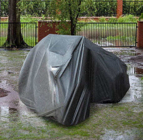 ATV cover, large gray protective outdoor shelter for a recreational vehicle.