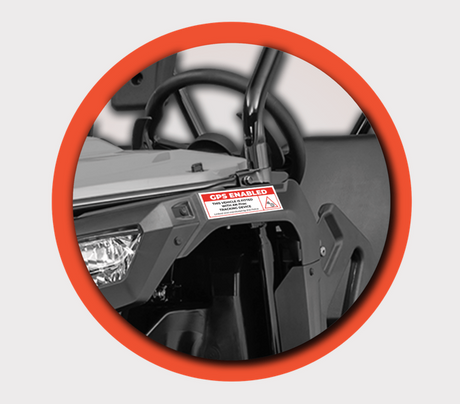 Sticker – Theft Deterrent iTrac (100mm x 40mm), red and white GPS-enabled label mounted on a utility vehicle.