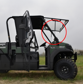 Windscreen opening strut for Kawasaki Mule Pro-DX mounted on a rugged utility vehicle