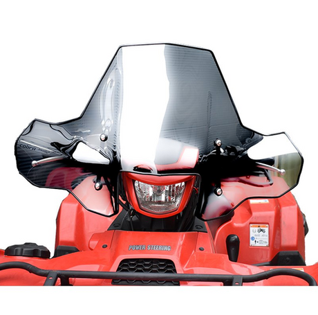 ATV windscreen Cobra Pro-Tek universal, clear with central headlight cut-out on a red ATV