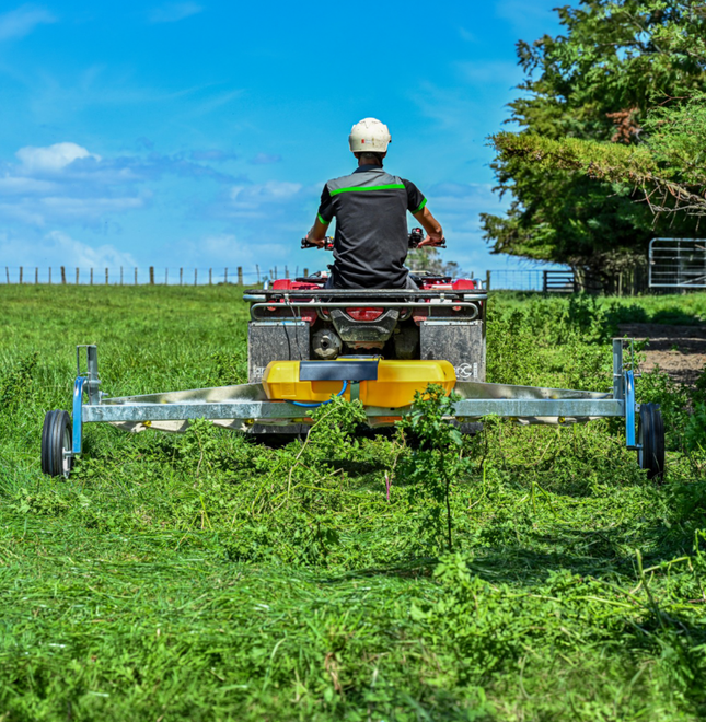 C-Dax Eliminator Weed Wiper – 2.4m, yellow tank tow-behind weed control system on a grassy field.