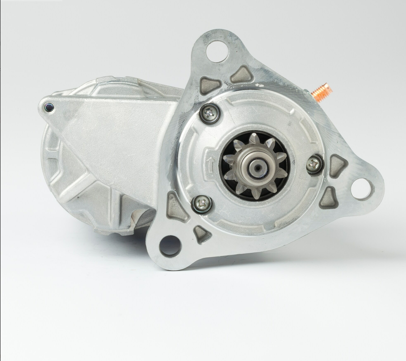 Denso gear reduction starter motor; silver metal body with flange mount and visible pinion gear