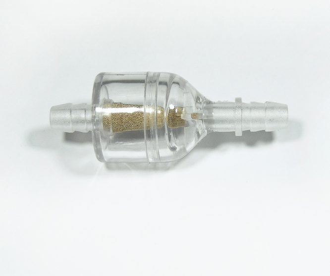 Inline fuel filter with clear plastic housing, brass mesh core, and 1/4 in barbed fittings.