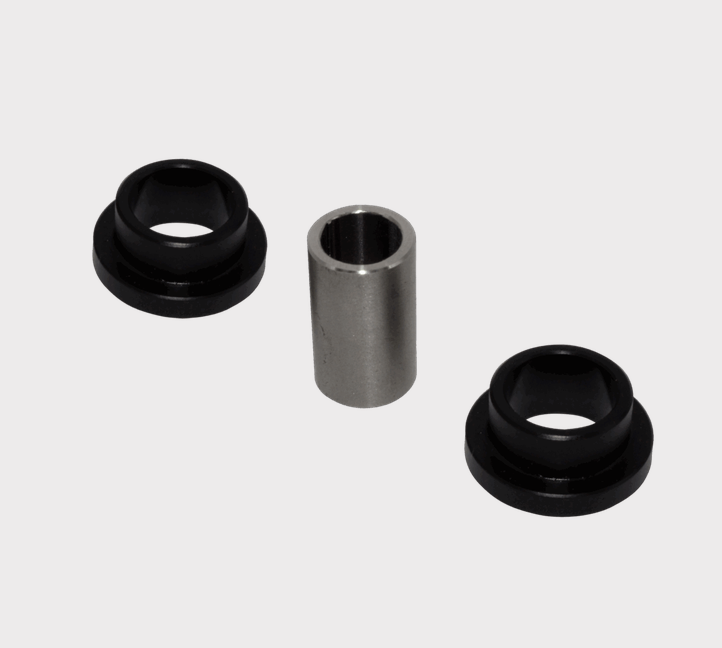 Front lower shock bush kit: two black rubber bushings with metal sleeves
