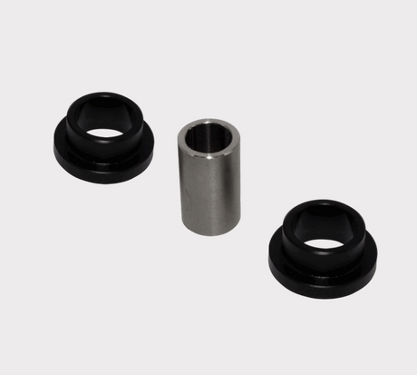 Front lower shock bush kit: two black rubber bushings with metal sleeves