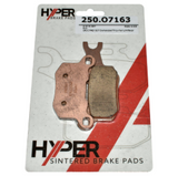 Brake pads by Hyper, sintered copper-colored pad visible on packaging card