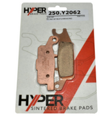 Rear left-hand disc brake pad set for Yamaha YFM550/YFM700 ATVs, Hyper sintered pads in packaging.