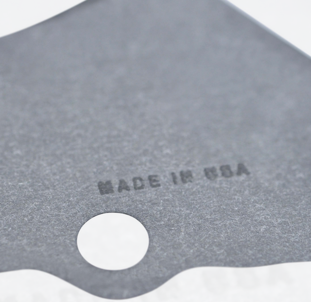 Stator Cover Gasket, dark gray metal with a circular mounting hole