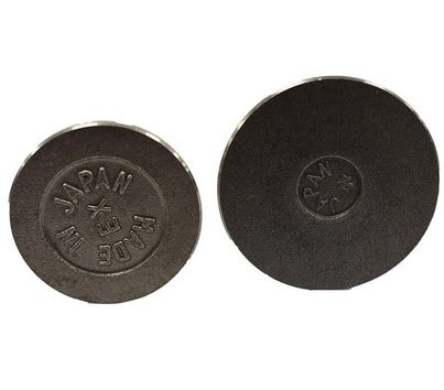 Engine valve pair, dark metal, two pieces with Japan-made markings