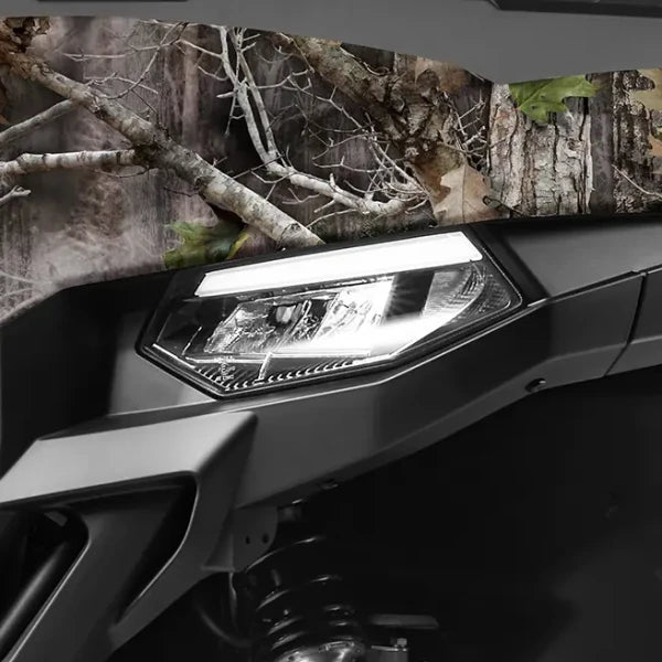 CFMOTO UFORCE 600 Highland UTV front close-up in black with prominent headlight