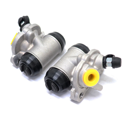 Brake cylinder set for Honda TRX250, aluminum body with black caps and yellow port plugs; set of two