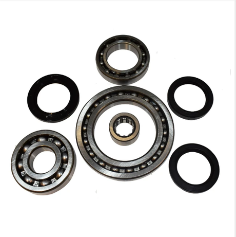 Set of 7 rear differential bearing and seal kit components: metal bearings and black seals for Suzuki Vinson ATV