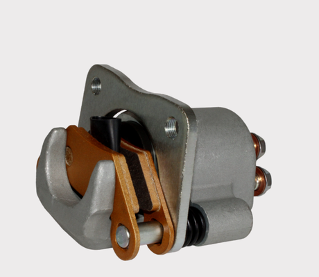Rear brake caliper for Polaris Sportsman 570 and Scrambler ATVs, metal gray body with copper-colored pads, ATV City aftermarket part
