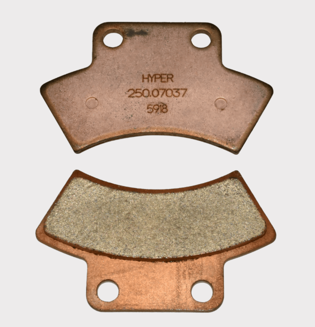 Rear brake pads set, copper-colored with Hyper label; fits Polaris Trail Blazer 1990-1998, Trail Boss 1998-1999, Big Boss 1989-1993.