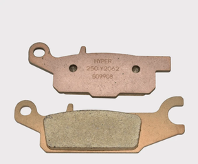 Brake pads pair, rear left for Yamaha YFM Grizzly 550/700, copper backing, Hyper stamped