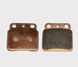 Rear brake pads, two copper-backed units with friction material for ATV quad models