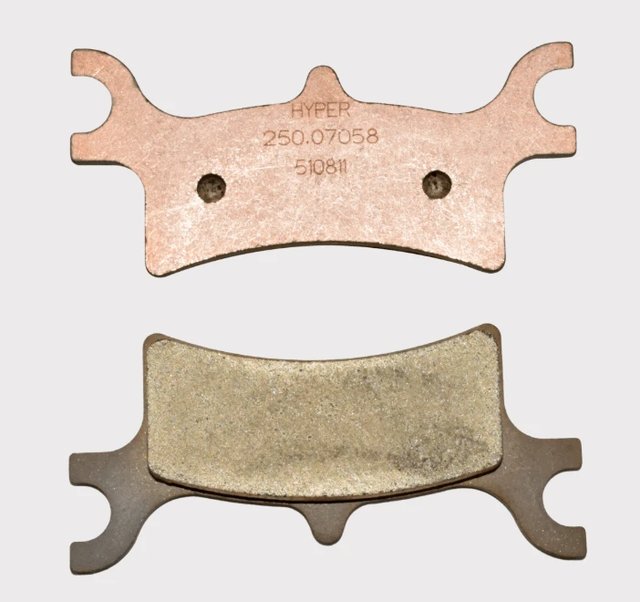 Rear Polaris Sportsman brake pads with copper backing plate; fits 1990–2006 Trail Blazer, Magnum Xpedition 2002 (ATV City)