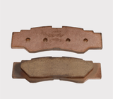 Rear YXZ 1000 brake pad set (2 pcs); copper-colored friction pads with Hyper stamp
