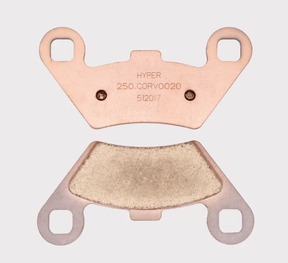 Disc brake pad pair for Corvus UTV rear EX4/DX4; copper-colored backing plate with friction pad