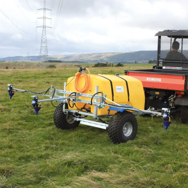 CDax SO500 Trailer Kit for sprayers with yellow tank and blue spray arms on a metal trailer