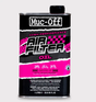 Muc-Off Air Filter Oil 1L bottle; biodegradable high-performance oil for vehicle air filters with black and pink label.