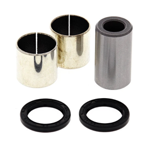 Shock Bush Kit for Honda TRX420 rear, including two silver sleeves, a grey spacer, and two black seals