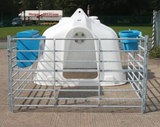 JFC Agri White Compact Group Calf Hutch with 4-teat milk feeder, blue buckets and metal pen fencing