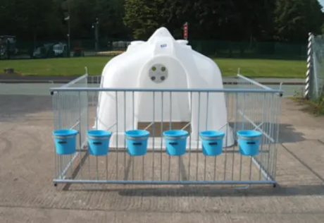 JFC Agri Compact Group Calf Hutch, white housing with 6 blue SB2 buckets on a metal pen