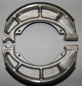 Brake shoes set for Suzuki LT-F250 Ozark/LT-Z250 Quadsport; pair of metallic rear shoes by ATV City (2003–2018).