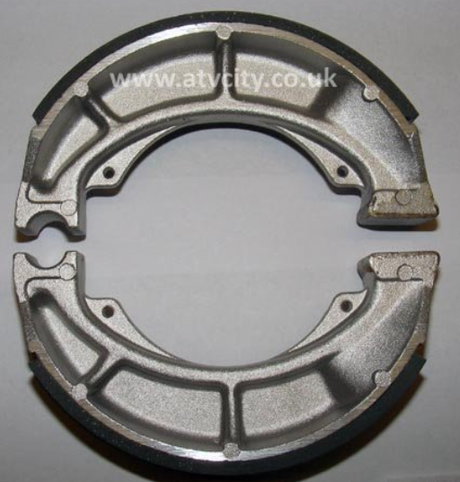 Brake shoes set for Suzuki LT-F250 Ozark/LT-Z250 Quadsport; pair of metallic rear shoes by ATV City (2003–2018).