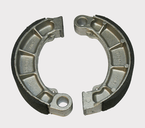 Brake shoes pair for Honda TRX Rancher/Foreman ATV (1995–2023); metallic gray with black friction lining