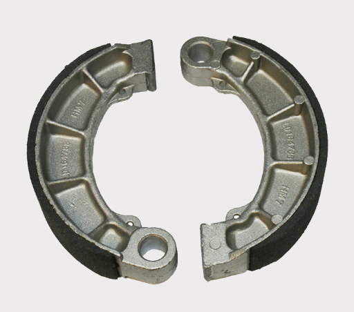 Brake shoes pair for Honda TRX Rancher/Foreman ATV (1995–2023); metallic gray with black friction lining