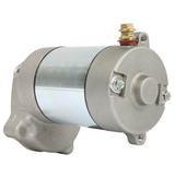 Starter motor for ATVs, silver metal housing, top-mounted solenoid.