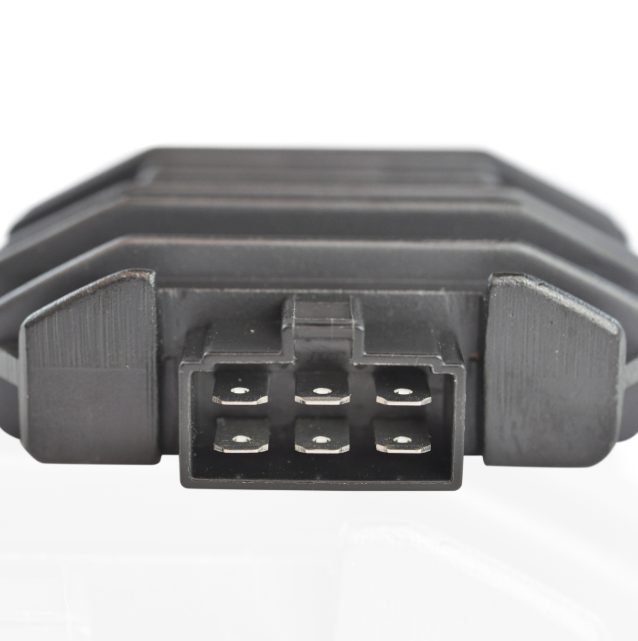 Regulator rectifier module with a 6-pin plug, black plastic housing for ATV voltage regulation.