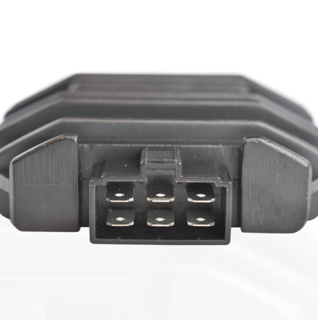 Regulator rectifier module with a 6-pin plug, black plastic housing for ATV voltage regulation.