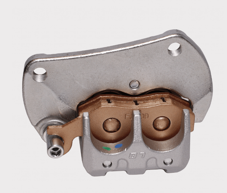 Front right brake caliper for Can-Am Maverick, OEM 705600678; silver housing with copper brake pads