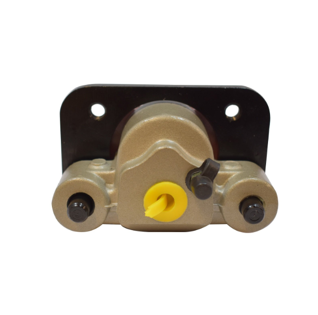 Brake Caliper with gold finish and black mounting plate; yellow center plug visible