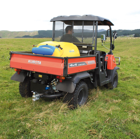 C-Dax 200 FD Gen 2 spray-on sprayer mounted on orange Kubota ATV with yellow tank and blue cap