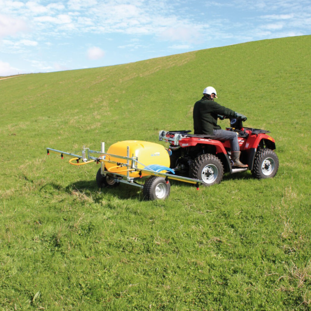 C-Dax Spray On 200 FD SO200 Gen 2 sprayer for ATVs, yellow tank on a trailer behind a red ATV