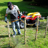 C-Dax SprayRider 50 G2 ATV sprayer; yellow 50L tank mounted on a red quad with an orange hose