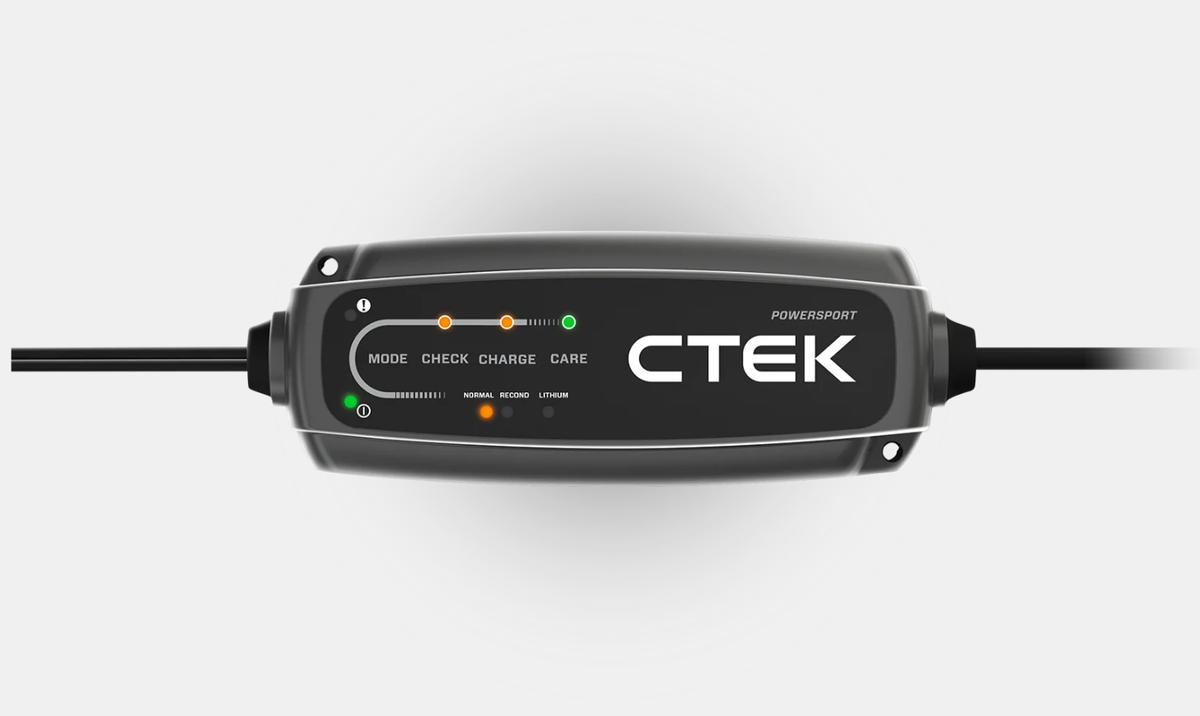CTEK CT5 Powersport 12/24V battery charger; black vehicle charger with LED indicators.