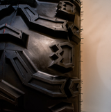 Mud Claw ATV tyre with aggressive tread pattern, black, 25x12.5x12