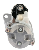 Denso starter motor, 12V 0.6kW, for Yanmar 3TNV engine; gray metal housing with white plastic connector