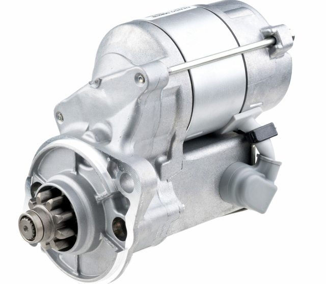 Starter motor by Denso, 12V 1.2kW for Kubota L Series, metallic silver finish.