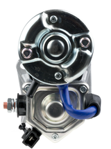 Denso starter motor, 12V 2.7kW, Caterpillar 400 series, metal housing with blue wire.